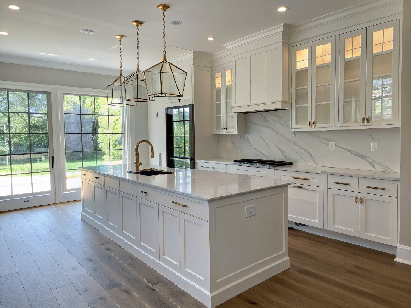 Calacatta quartz waterfall kitchen island in a Dunwoody residence